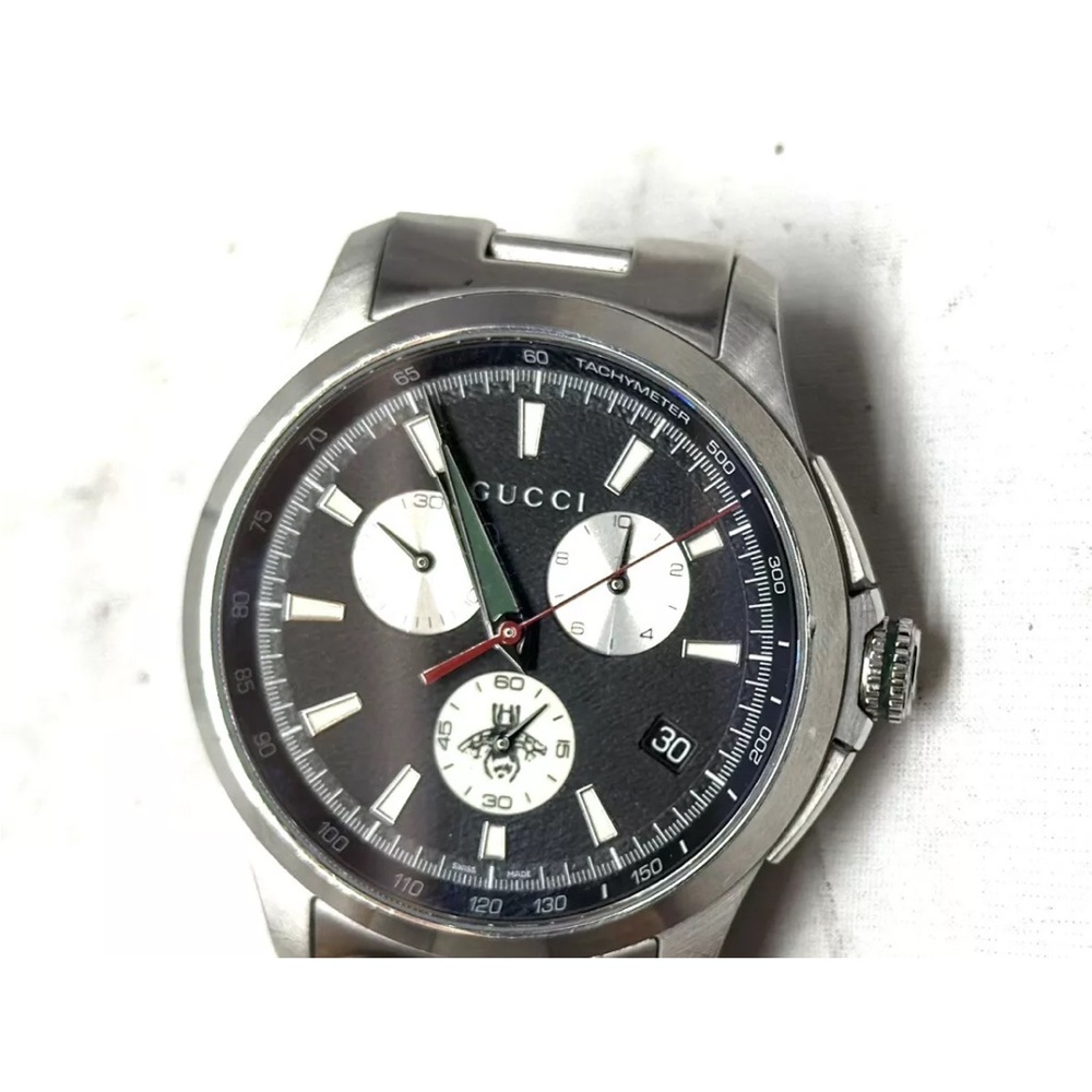 Gucci G timeless mens watch in nearly perfect condition. With the original box